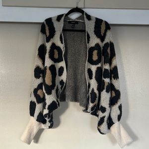 Soft and fabulous cheetah print cardigan/shrug.